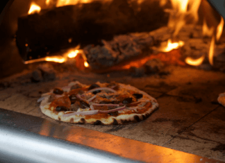 Choosing an Outdoor Pizza Oven Wood Fired Pizza photo by Emily Austin ( empowers_photography) on Unsplash