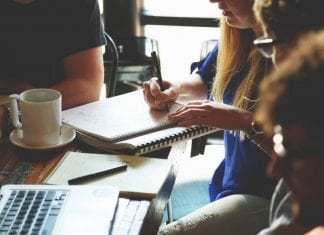 7 Ways to Set Child’s Approach to Learning through Primary Tuition Person Writing on the Notebook