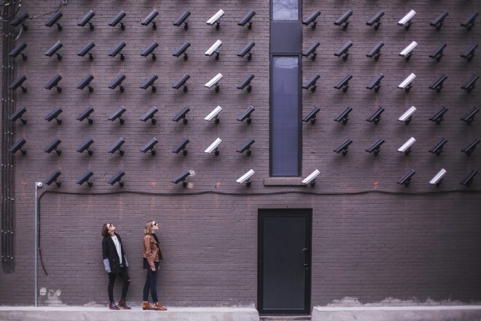two-person-standing-under-lot-of-bullet-cctv-camer Two Person Standing Under Lot of Bullet Cctv Camera