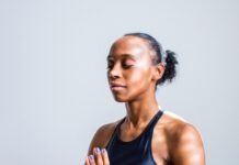 How your smartphone can help calm your life woman wearing black sports bra