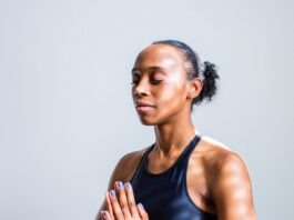 How your smartphone can help calm your life woman wearing black sports bra
