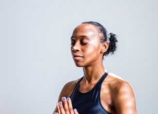 How your smartphone can help calm your life woman wearing black sports bra