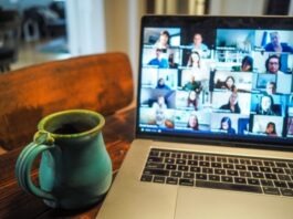 The Top Tips for Managing a Remote Workforce macbook pro displaying group of people