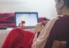 The Best Anime to Watch on Crunchyroll woman in red sweater sitting on chair