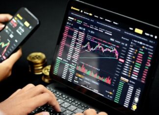 The Risk Involved in Online Trading person using black tablet computer