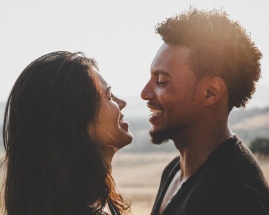 7 Things You Can Do to Improve Your Relationship While Working From Home man and woman facing