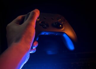 How games rely on fresh content to keep players entertained A picture containing remote, person, indoor, control Description automatically generated