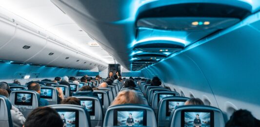 The Everlasting Comfort Memory Foam Travel Pillow: How to Make the Most of Any Trip people in airplane during daytime
