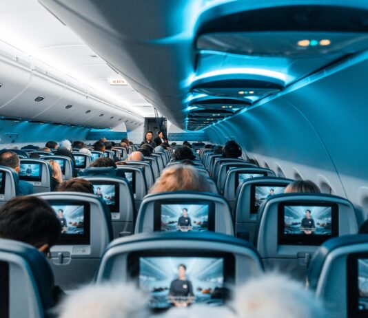 The Everlasting Comfort Memory Foam Travel Pillow: How to Make the Most of Any Trip people in airplane during daytime