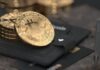Cryptocurrency Volatility: Both an Advantage and a Disadvantage silver round coin on black leather case