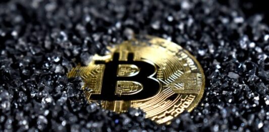 Essential Factors of Bitcoin Mining gold and black round emblem