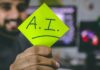 How Is AI Reshaping Email Marketing In 2022? person holding green paper