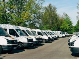 Top 5 Gadgets to Reduce Vehicle Insurance cars parked on parking lot during daytime