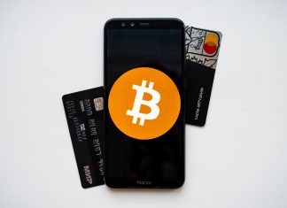 The Reasons for the Boom of Crypto Casinos black android smartphone on white surface