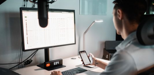 Biggest Entrepreneurship Trends to Watch in 2022 and 2023 person in white shirt using macbook pro