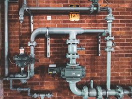 How to Choose the Plumbing Pipes for Commercial Building black and gray metal pipe