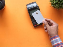 Popular Myths About PCI person holding black and white electronic device
