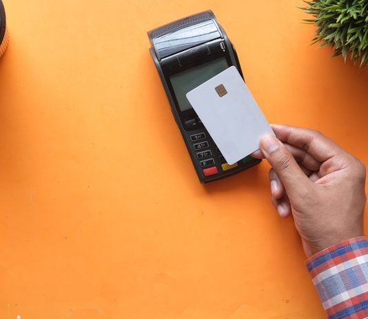 Popular Myths About PCI person holding black and white electronic device