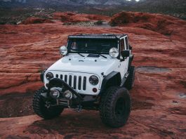 Is the Jeep Wrangler 4xe Hybrid a Real Jeep? white Jeep Wrangler on land