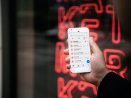 Mandatory Eat-and-Run Verification to Prevent Scams person holding white samsung galaxys 4