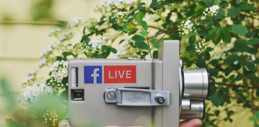 3 Tips to Use Social Media to Boost Your Website Traffic person holding gray video camera near green leaf plant during daytime