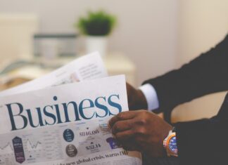 How To Choose a Forex Broker: Everything You Need to Know person wearing suit reading business newspaper