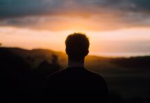 What Is Conversion Therapy? silhouette of a man facing the sunset