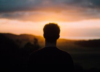 What Is Conversion Therapy? silhouette of a man facing the sunset