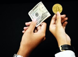 How to Define Bitcoin Characteristics? person holding 20 us dollar bill