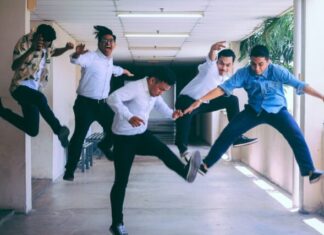 How to Improve Employee Experience group of people doing jump shot photography
