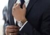 7 Things to Remember While Hiring Truck Accident Lawyer man wearing watch with black suit