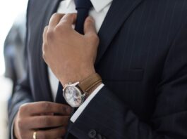 7 Things to Remember While Hiring Truck Accident Lawyer man wearing watch with black suit