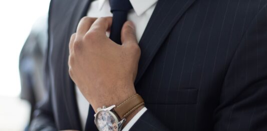 5 Tips for Finding a Reliable Immigration Lawyer in Hartford CT man wearing watch with black suit