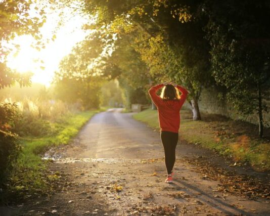 Understanding the Concept of Holistic Recovery: 10 Things You Should Know About woman walking on pathway during daytime