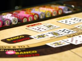 Baccarat vs. Blackjack: Differences and Similarities Between the Two Games white red and black game board