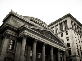 Why Are Central Banks Impressed by Blockchain and Bitcoin? grey concrete building