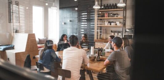 5 Ways Office Fit-Outs Boost Employee’s Productivity people sitting on chair