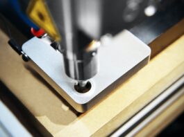 Machining technology for industrial and private projects of furniture construction black and silver electronic device