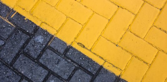 4 Ways to Improve Your Pavement black and yellow bricks