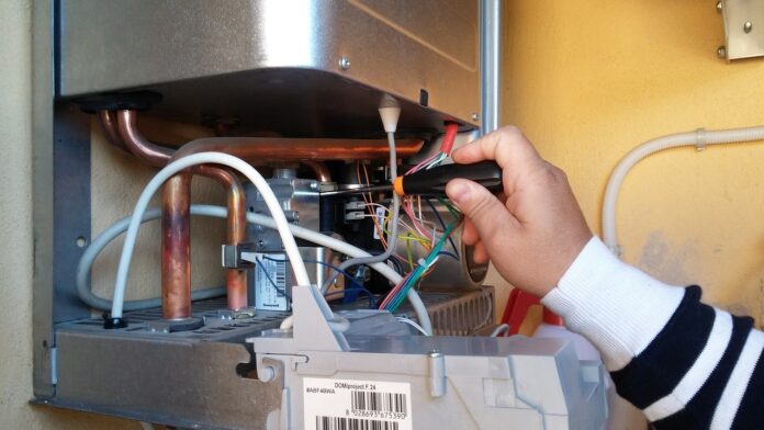 Photo by paolobros water heater, boiler maintenance, broken boiler