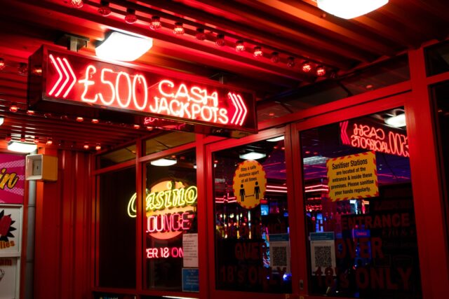 Photo by ben frost red and white coca cola neon signage