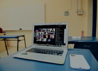 Steps to Choose Best Virtual Event Platforms macbook pro on blue table