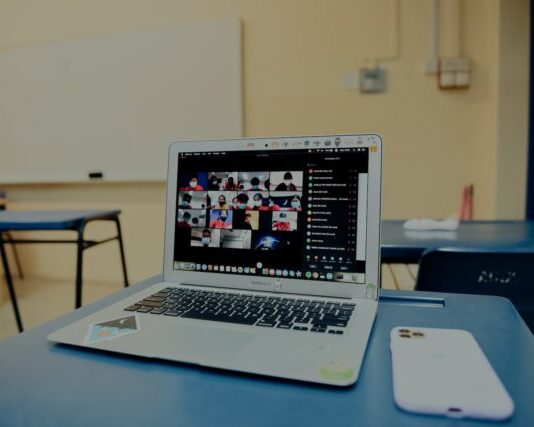 Steps to Choose Best Virtual Event Platforms macbook pro on blue table