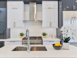Why Is My Kitchen Sink Leaking — Common Causes gray stainless steel faucet