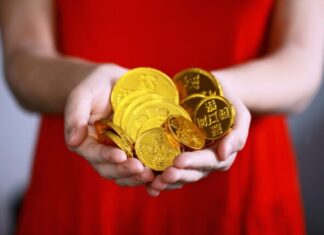 Need to Purchase Digital Yuan? Discover the Procedure in Brief! person holding gold-colored ching coins