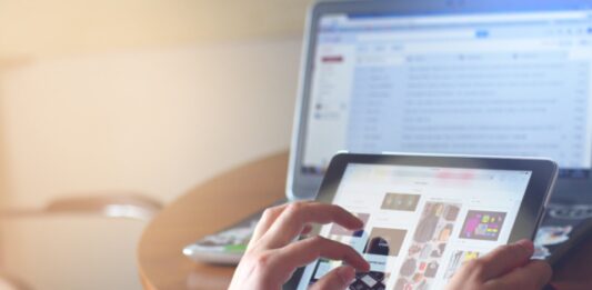 Top 8 Website Optimization Techniques to Improve User Experience person holding black iPad
