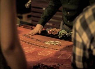 How to Behave in a Casino: Tips for a Beginner man in green dress shirt sitting on chair