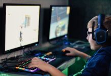 What You Need to Know About Esports Competitions boy wearing headset playing computer game