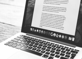 Which Software Allows You to Create and Edit Documents? silver MacBook showing application