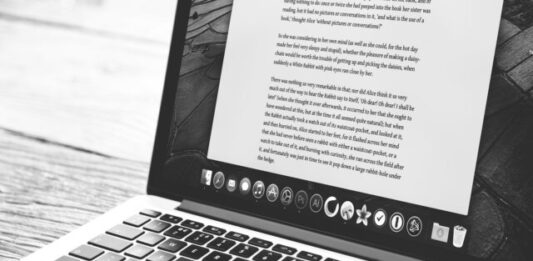 Which Software Allows You to Create and Edit Documents? silver MacBook showing application